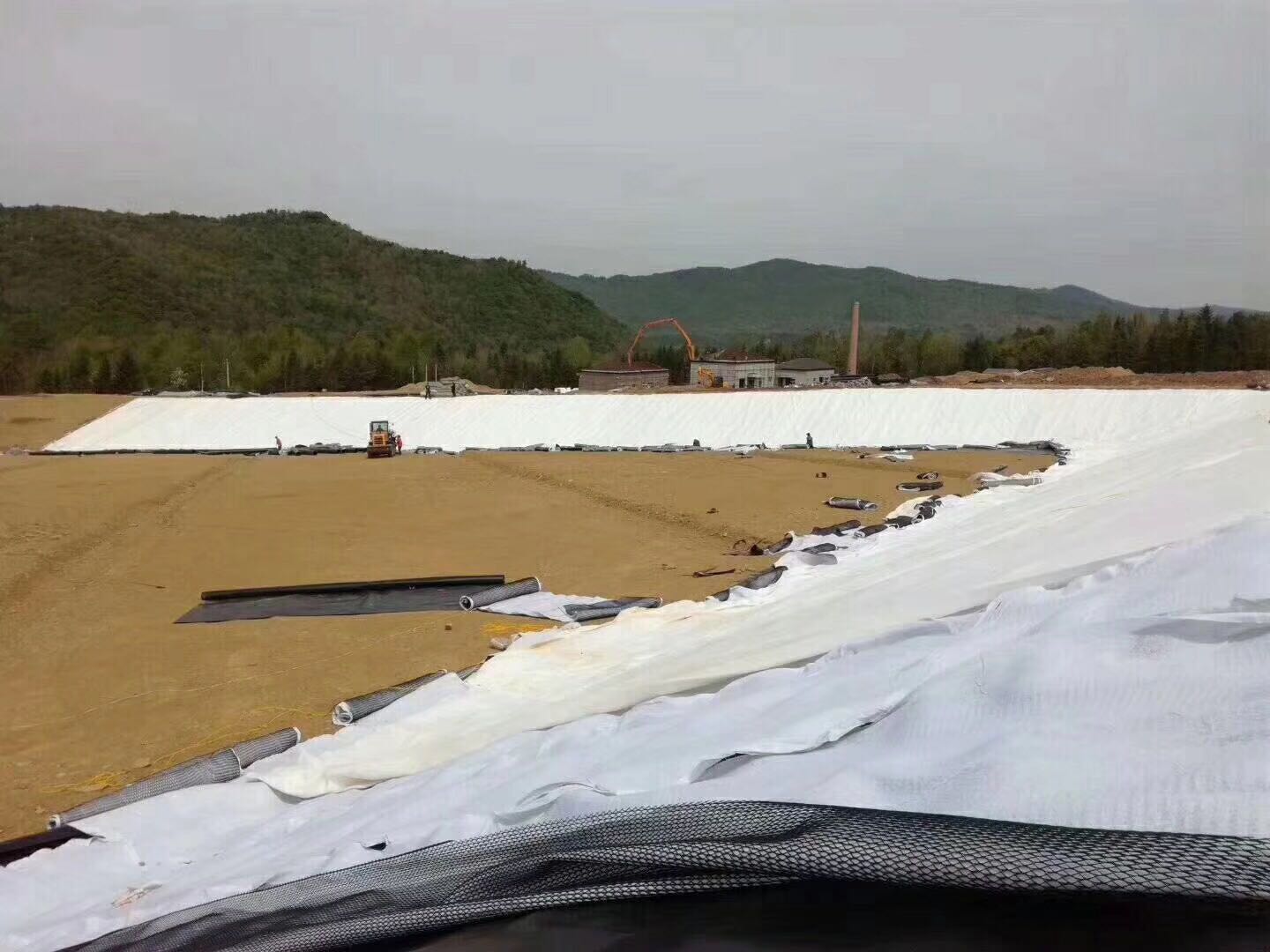 蓄水池边坡和渠坡与建筑物锚固橙子视频app在线下载膜注意事项